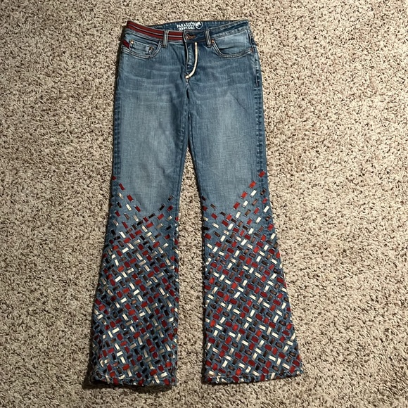 Size 29 flare jeans with maroon brown and tan ribbon designs on bottom parts - Picture 3 of 7